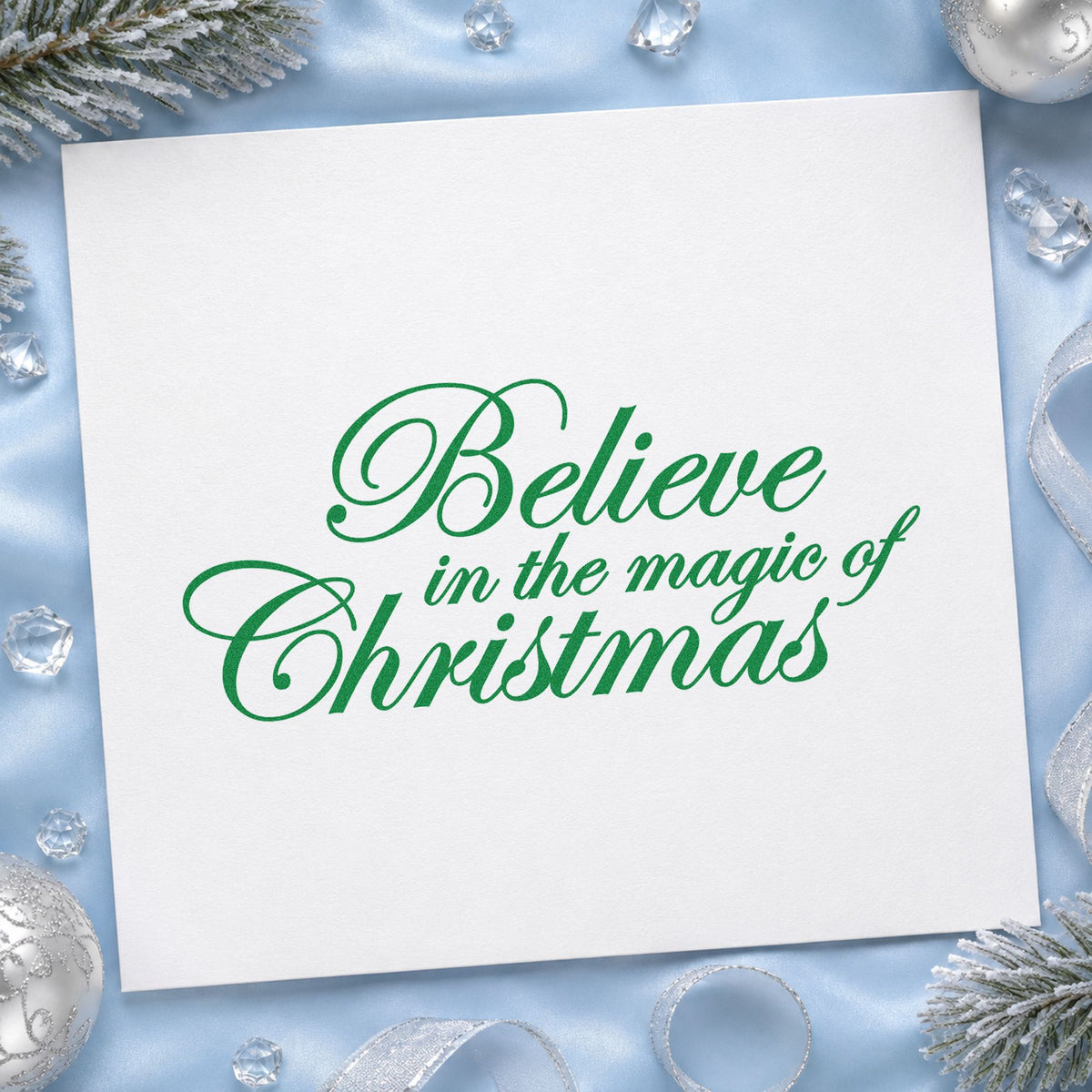 Believe Magic Of Christmas Script craft stamp imprint in green ink on a handmade project, one idea being reception table cards.