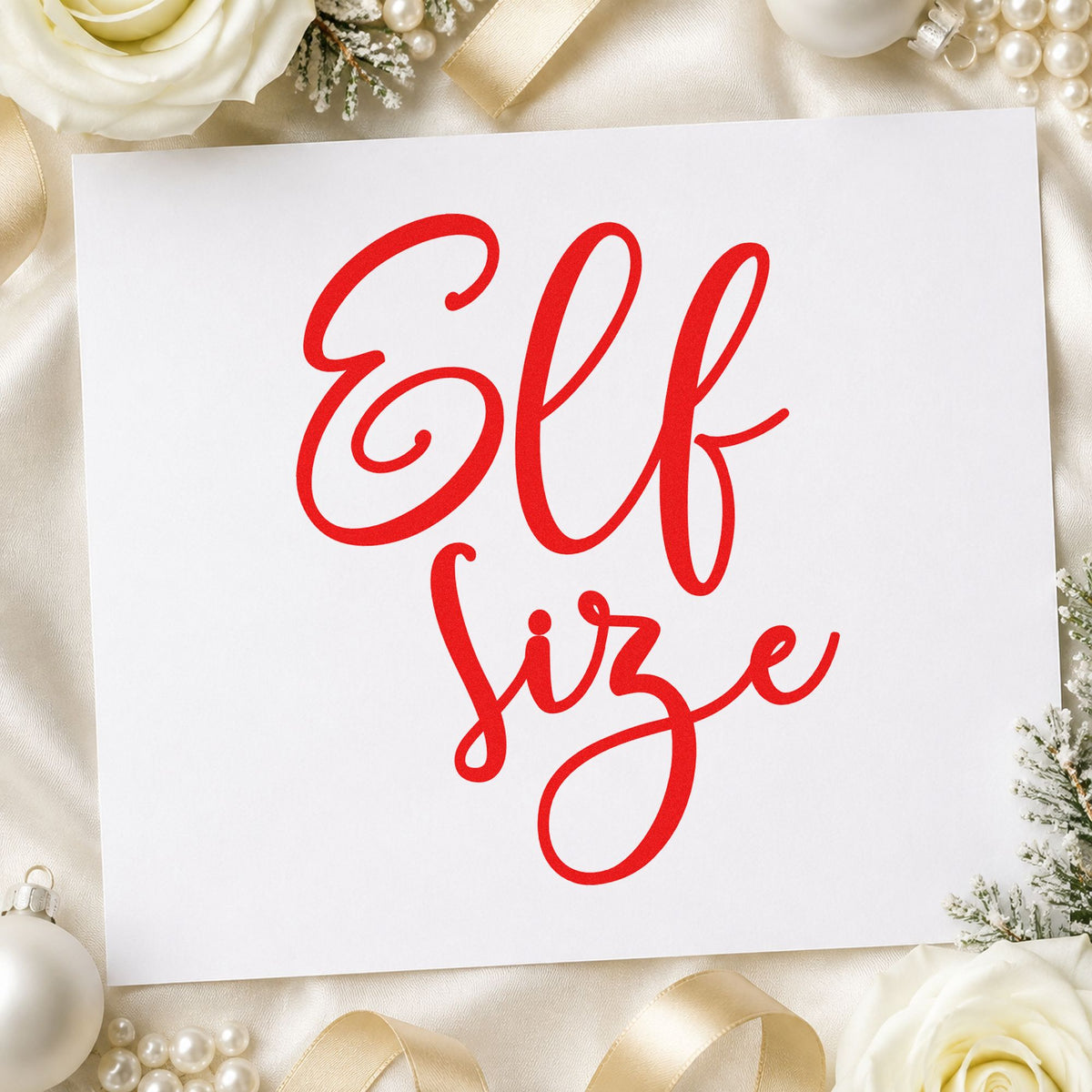 Elf Size Script craft stamp in red ink on cardstock, an easy option for child tee printing.