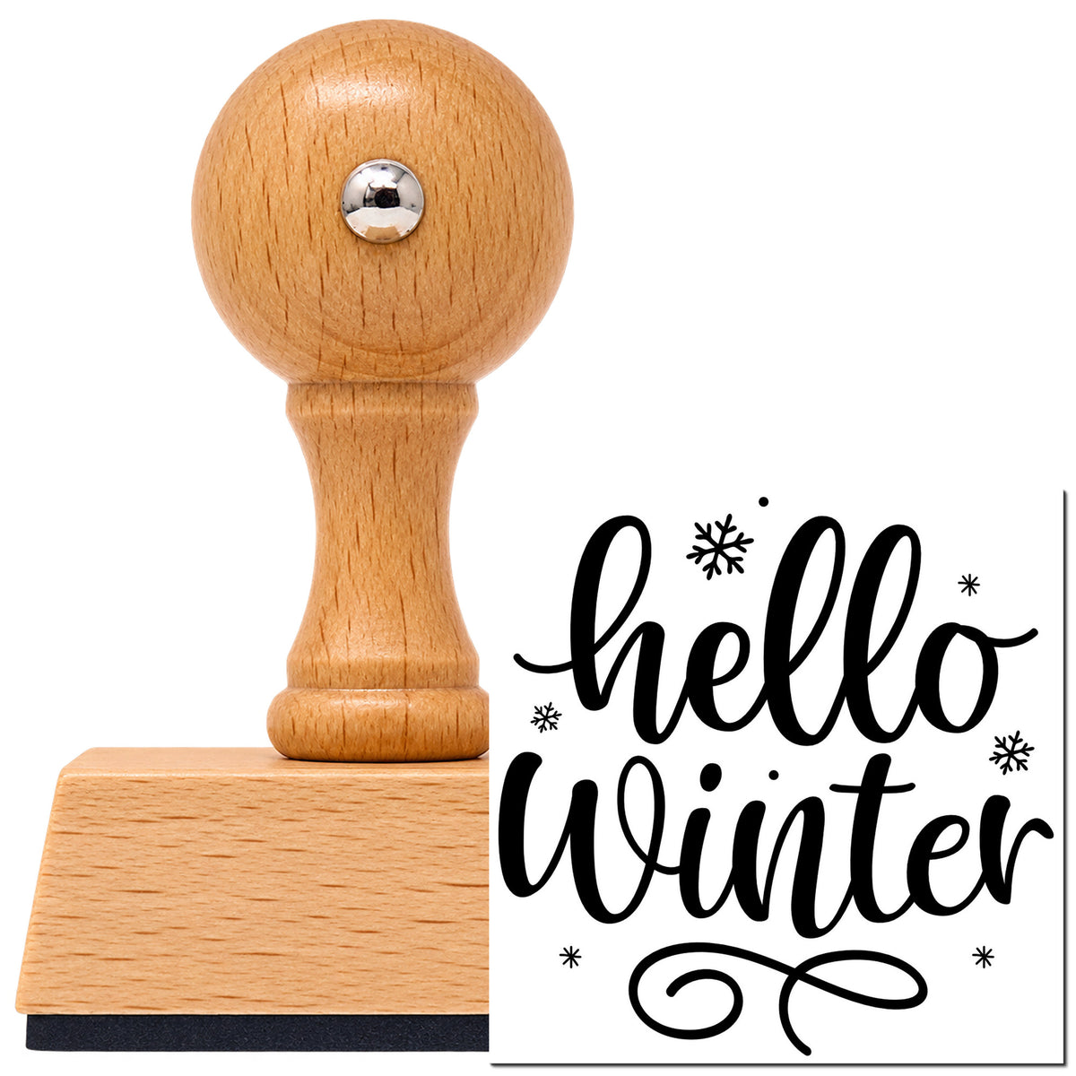 Hello Winter Snowflakes Vintage Pro rubber stamp in European beech wood with a round knob handle, shown beside its black imprint.