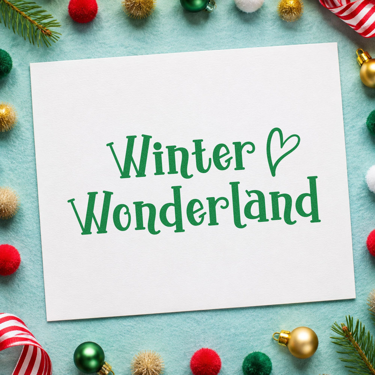 Winter Wonderland Heart craft stamp imprint in green ink on a handmade project, one idea being wool sock gift tags.