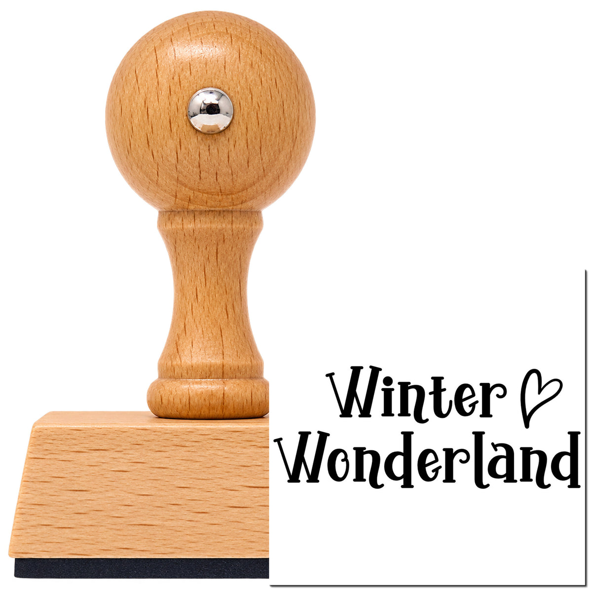 Winter Wonderland Vintage Pro rubber stamp in European beech wood with a round knob handle, shown beside its black imprint.