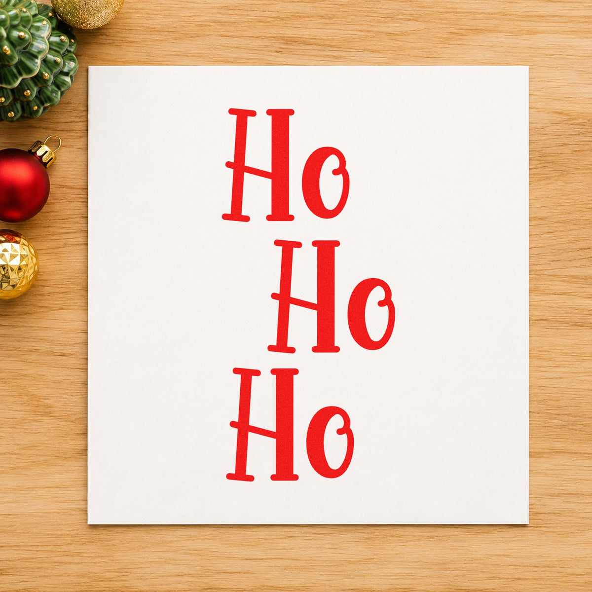 Three Stacked Ho Words craft stamp in red ink on cardstock, an easy option for sweatshirt chest ink.