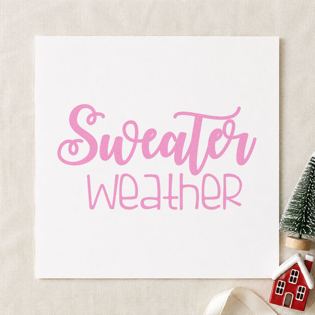 Sweater Weather Script craft stamp in purple ink on cardstock, an easy option for knitting album page.