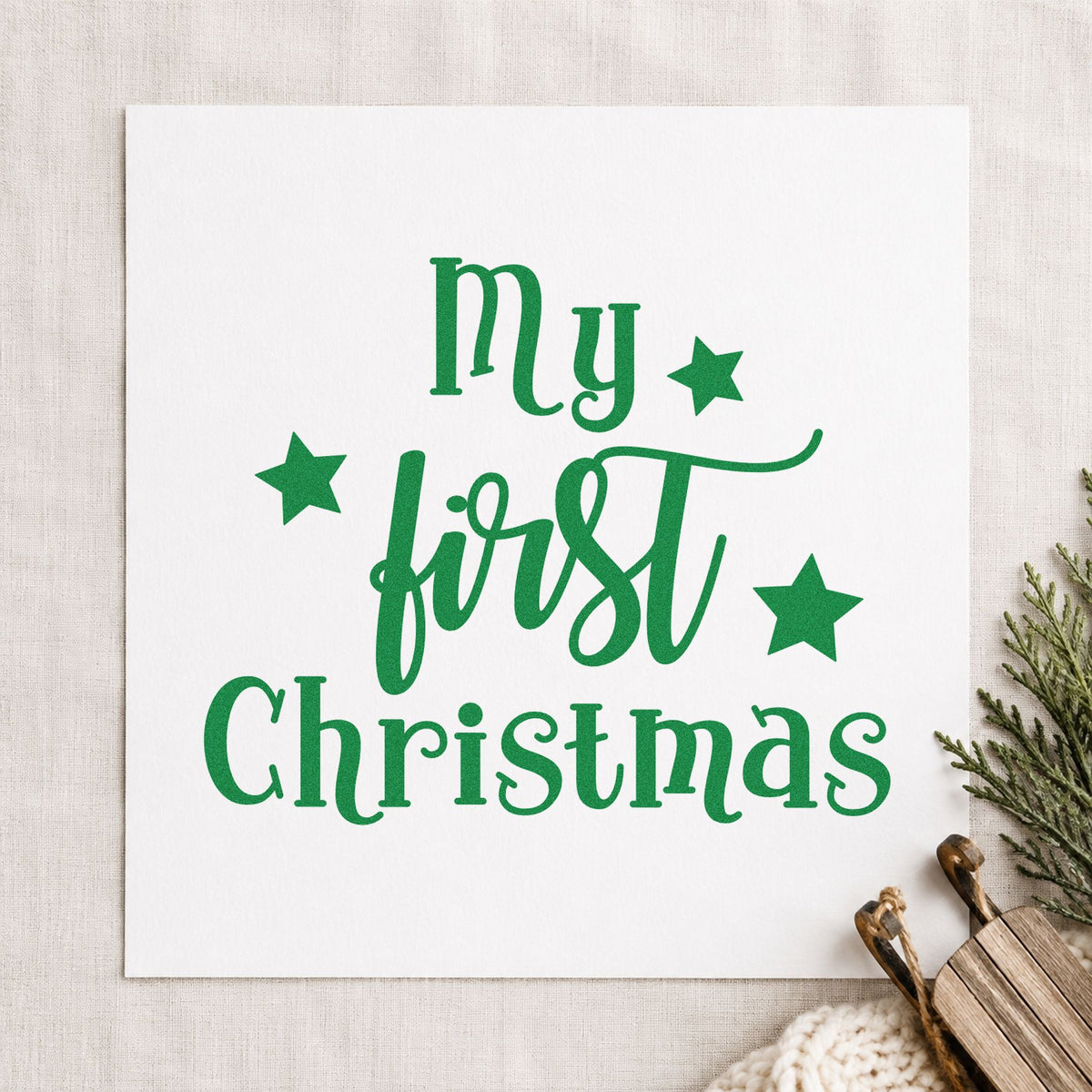 My First Christmas Stars craft stamp imprint in green ink on a handmade project, one idea being pet stocking tags.