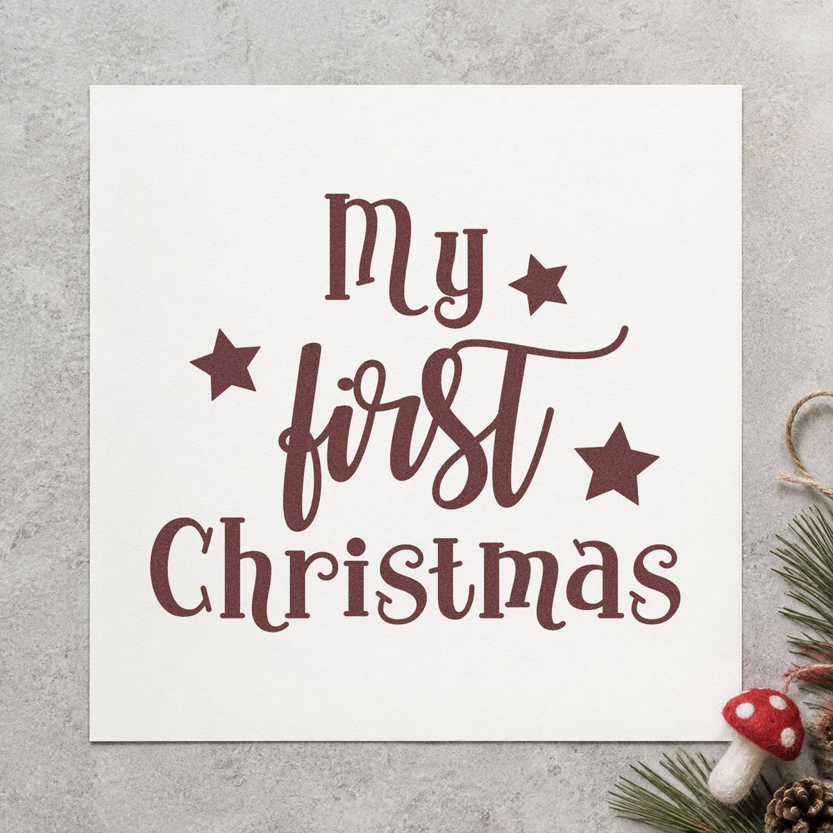 My First Christmas Stars rubber stamp printed in brown ink, ready for new home log sheet and similar paper crafts.