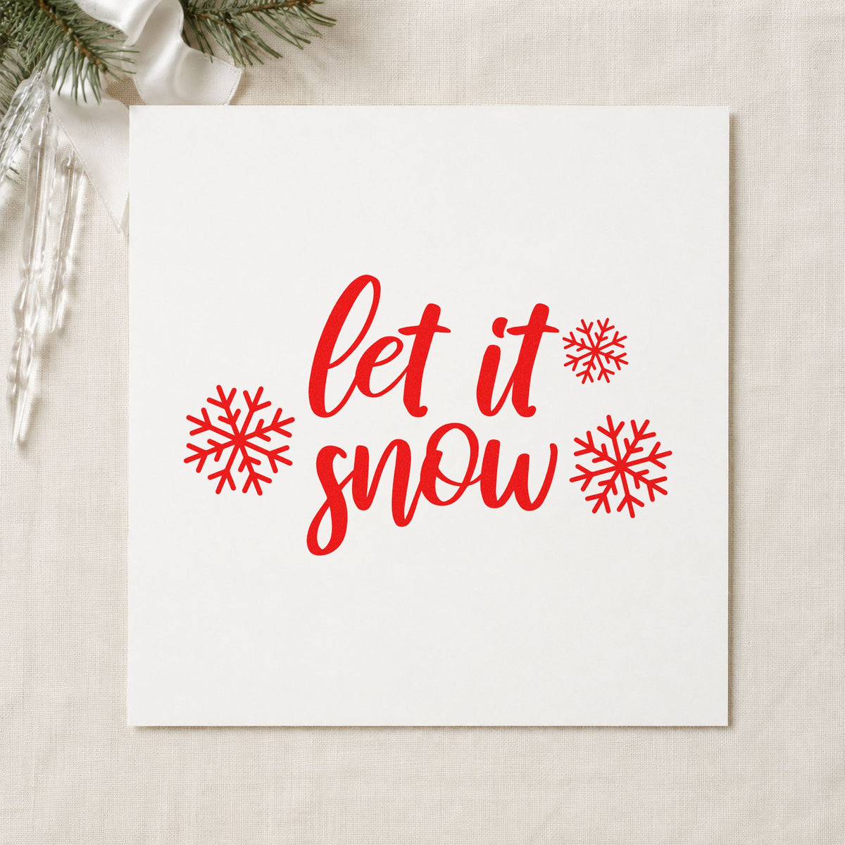 Let It Snow Three Snowflakes craft stamp in red ink on cardstock, an easy option for quilt label printing.