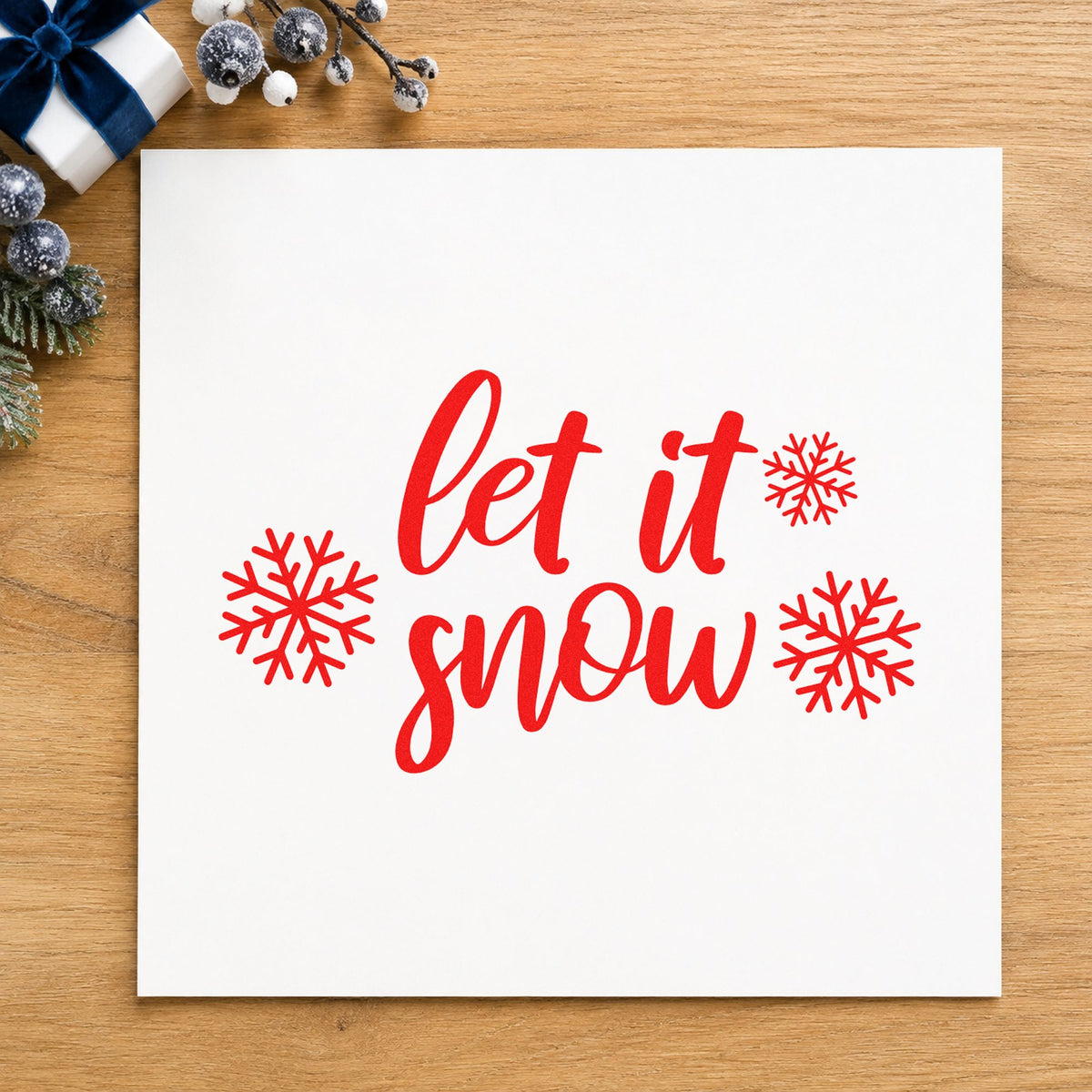 Let It Snow Three Snowflakes rubber stamp shown in red ink, stamped for projects such as thread box labels.