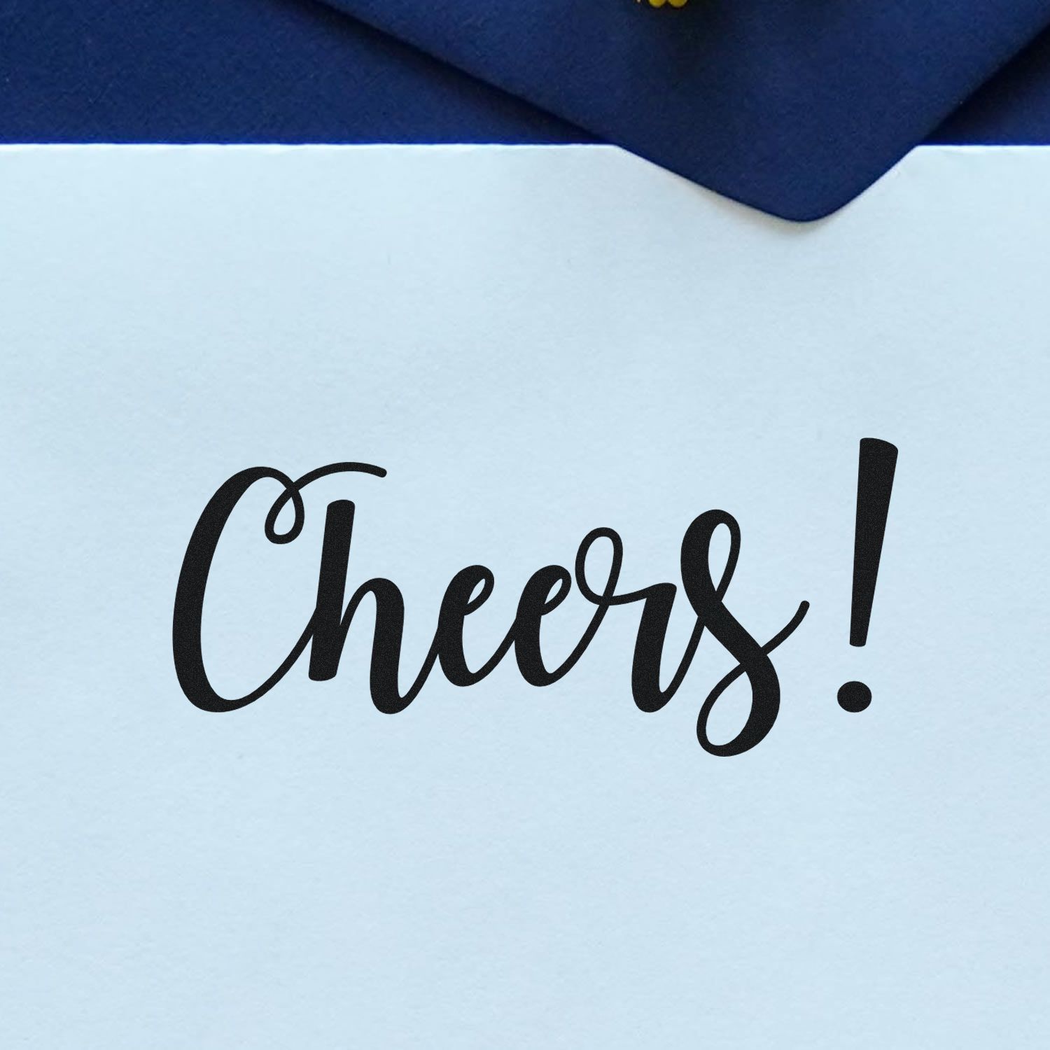 Cheers! custom rubber stamp impression on white card, ideal for thank-you cards, invitations, and handmade packaging.
