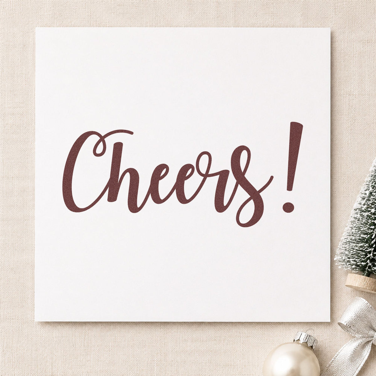Cheers Flowing Script rubber stamp printed in brown ink, ready for cocktail recipe sheet and similar paper crafts.