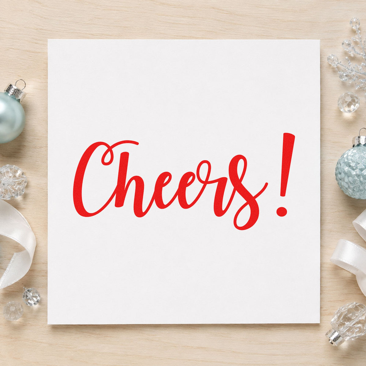 Cheers Flowing Script rubber stamp shown in red ink, stamped for projects such as bottle neck labels.