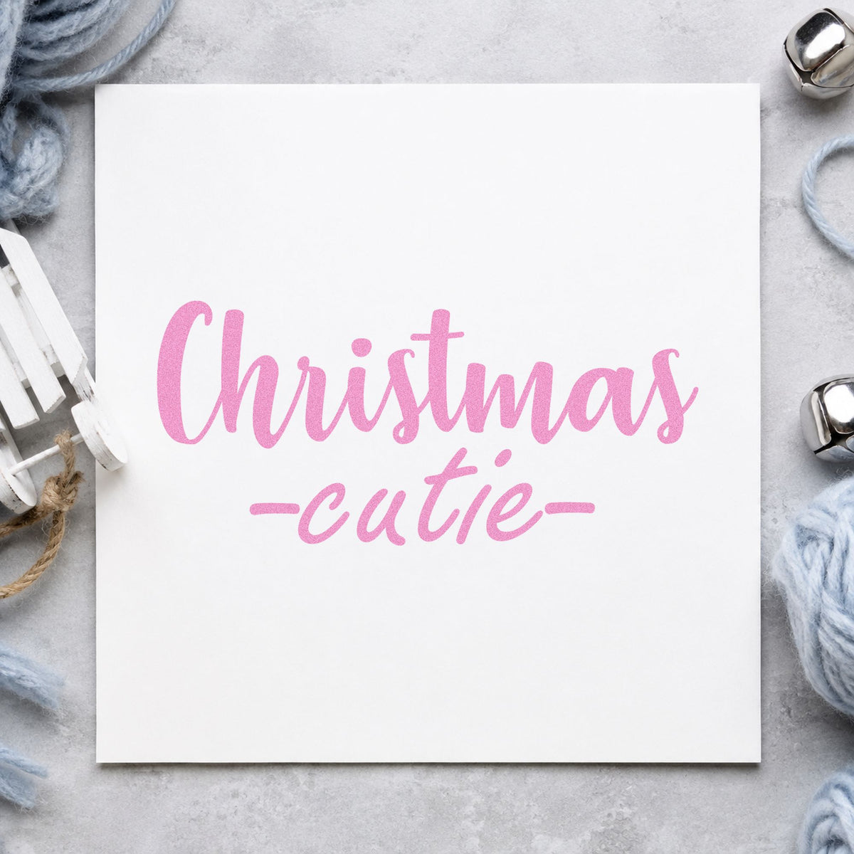 Christmas Cutie Script craft stamp in purple ink on cardstock, an easy option for portrait album page.