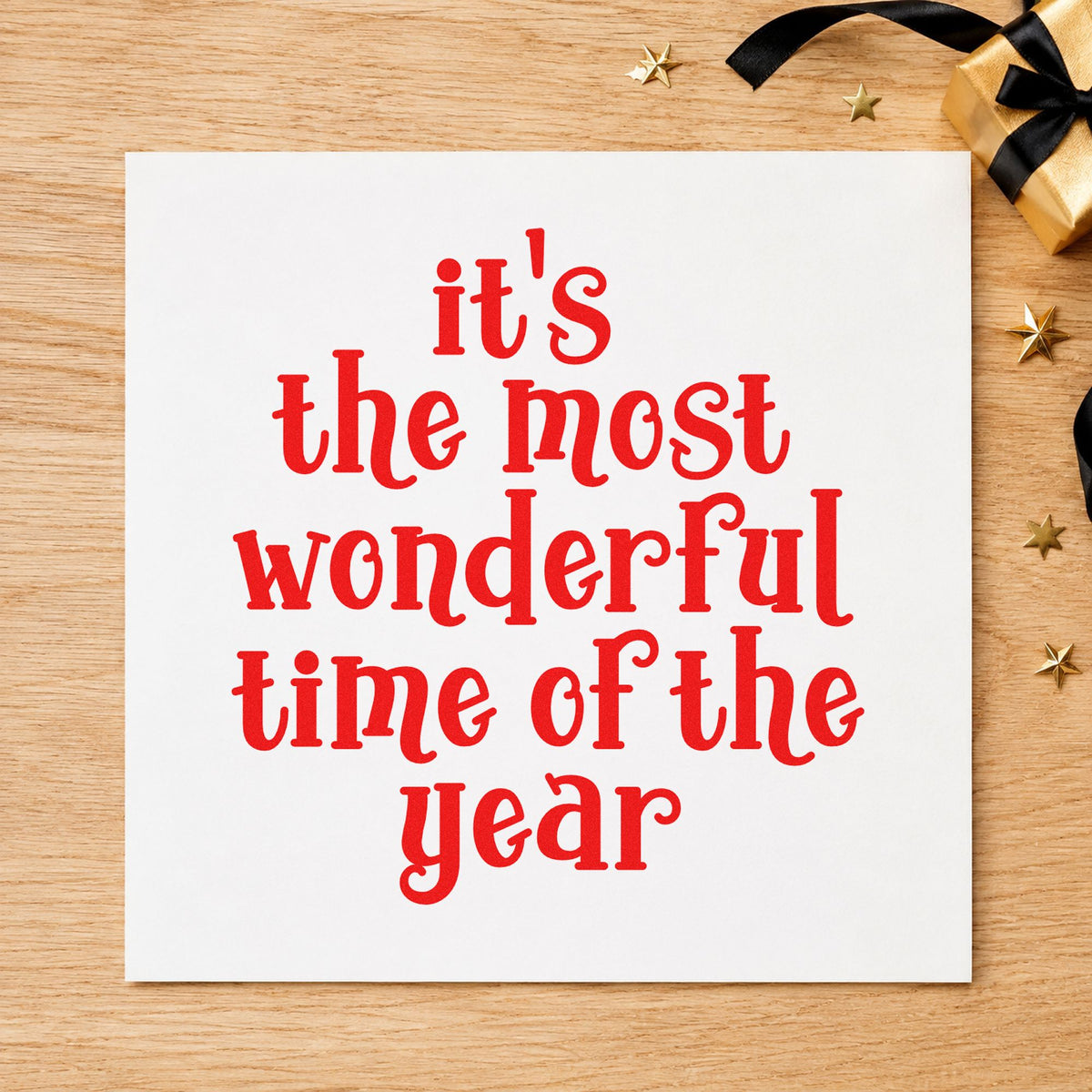 Most Wonderful Time Of Year craft stamp in red ink on cardstock, an easy option for duffel panel printing.
