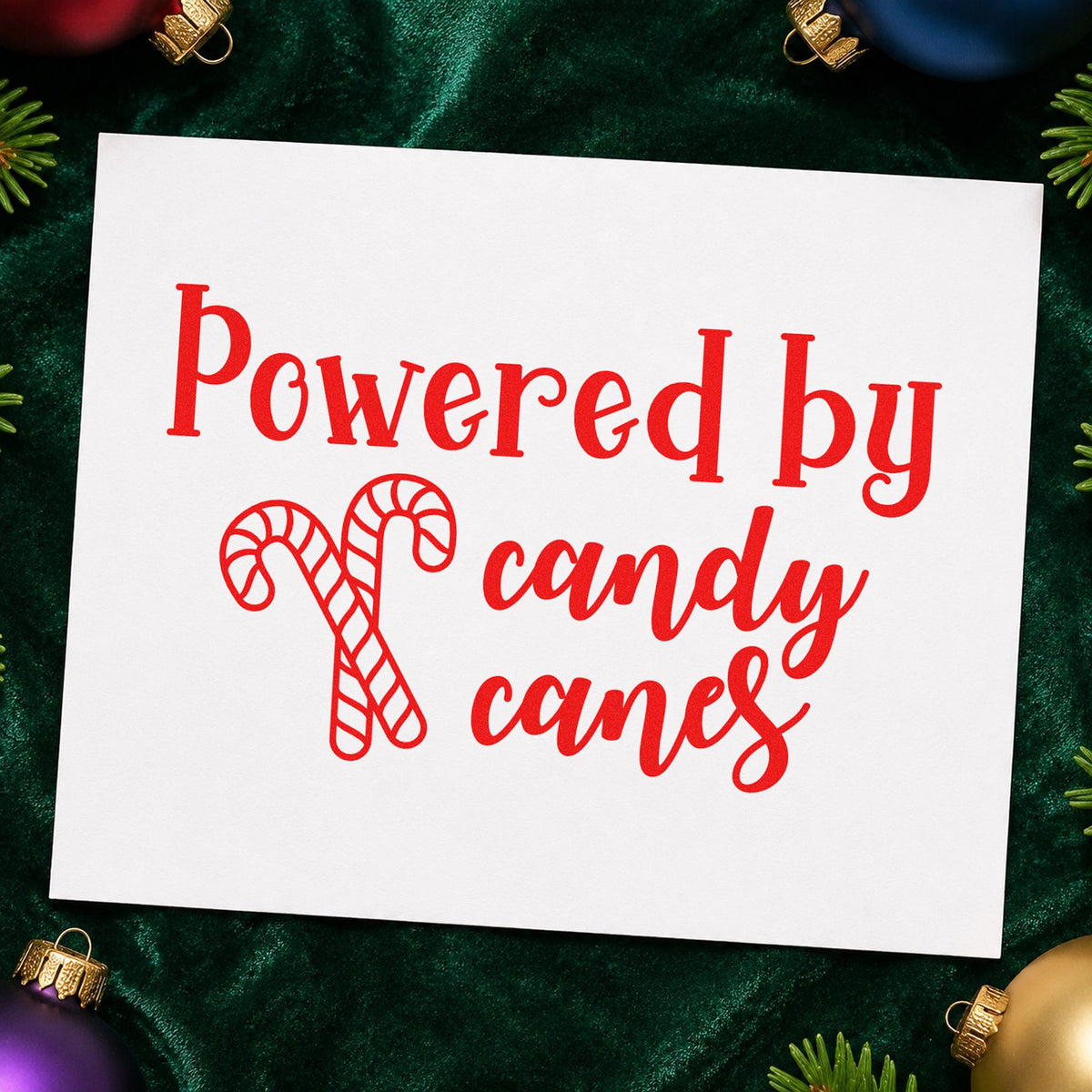 Powered By Candy Canes rubber stamp shown in red ink, stamped for projects such as jar scoop labels.