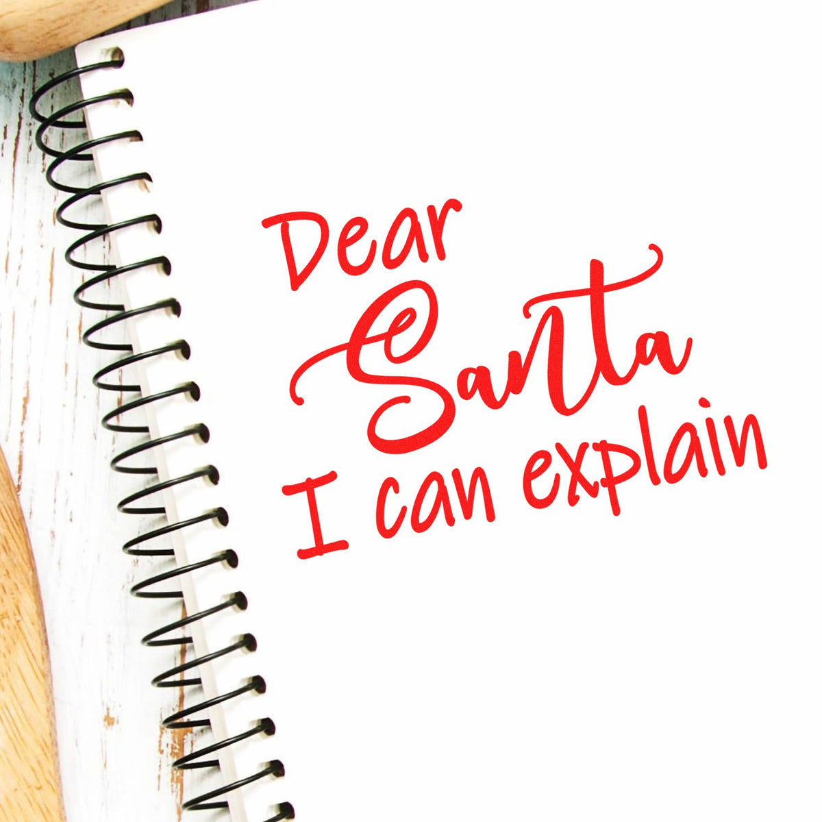 Dear Santa I Can Explain Script rubber stamp shown in red ink, stamped for projects such as blooper album page.