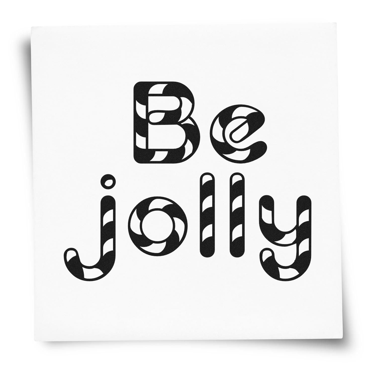 Be Jolly rubber stamp design in bold decorative black typography on a white card for holiday crafting and custom stamping.