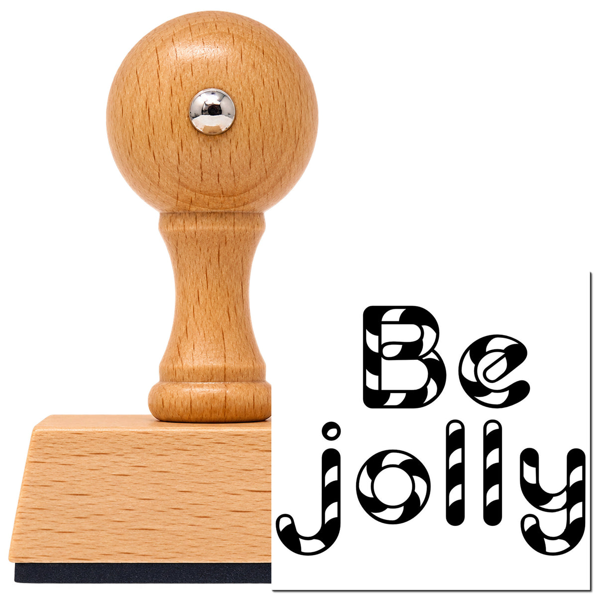 Be Jolly Patterned Letters Vintage Pro rubber stamp in European beech wood with a round knob handle, shown beside its black imprint.
