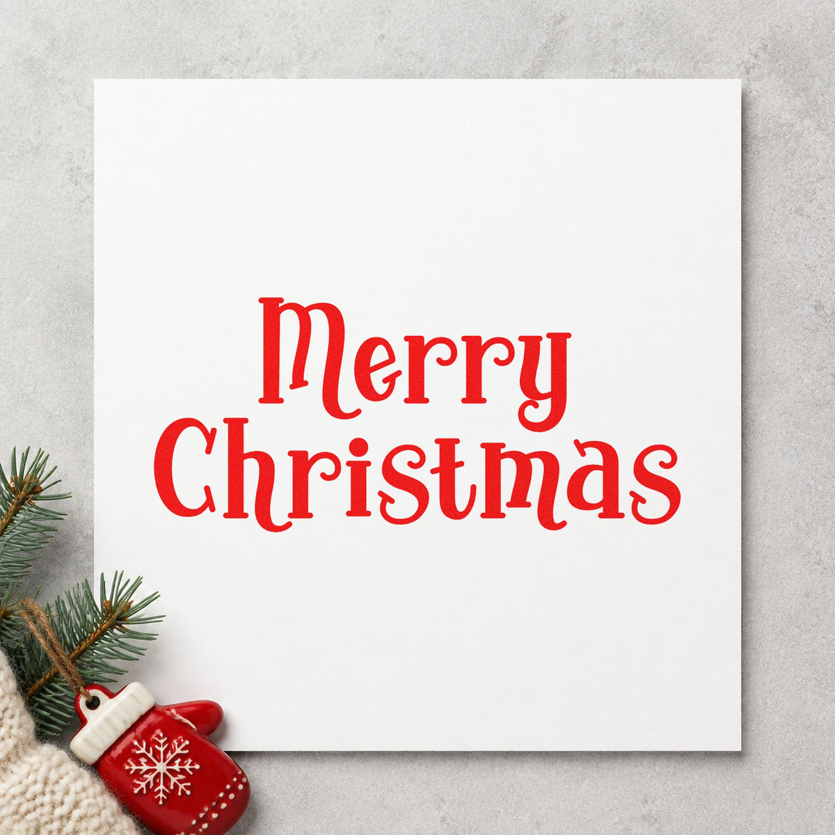 Merry Christmas Decorative Serif craft stamp in red ink on cardstock, an easy option for silk lining printing.