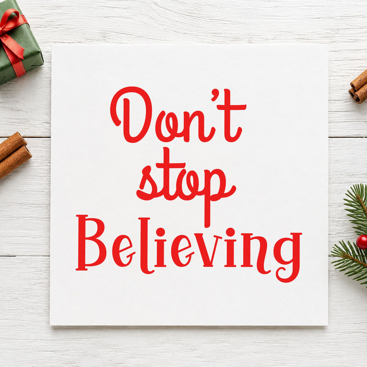 Don't Stop Believing craft stamp in red ink on cardstock, an easy option for gym bag ink print.