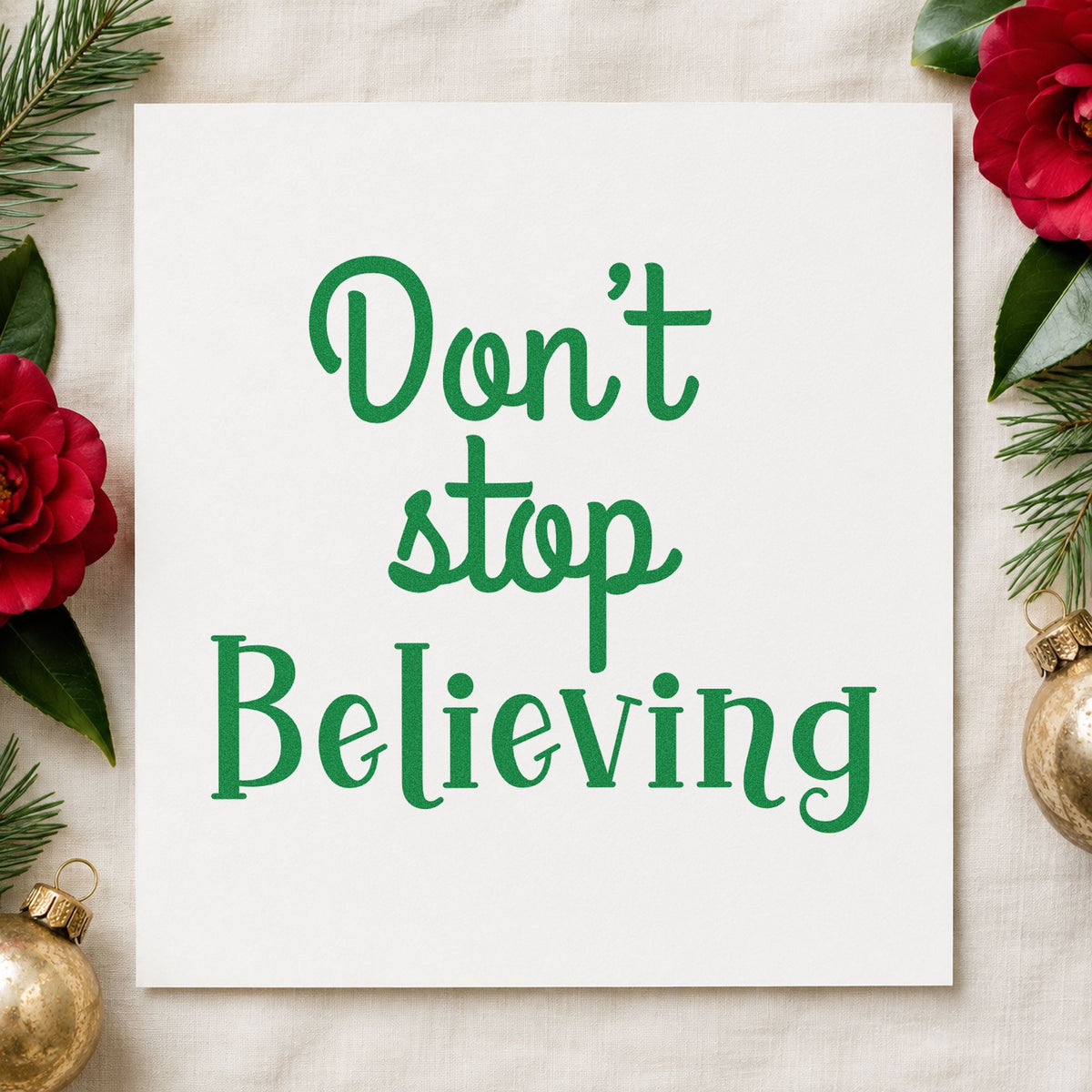 Don't Stop Believing craft stamp imprinted in green ink on paper, a design suited to framed desk reminder.