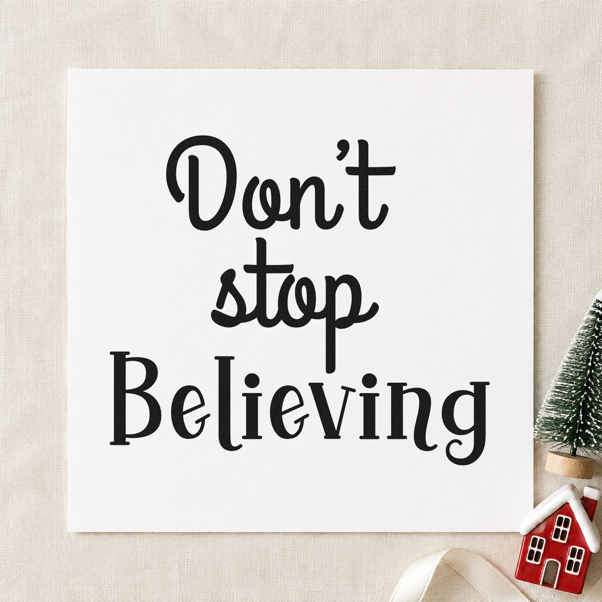 Don't Stop Believing rubber stamp printed in black ink, ready for dont stop cards and similar paper crafts.