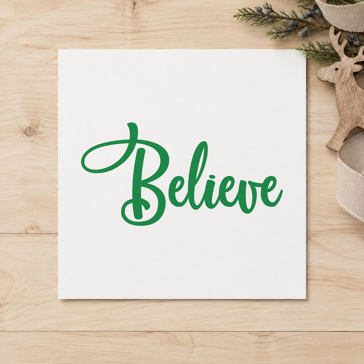 Believe Bold Script craft stamp imprinted in green ink on paper, a design suited to framed letter print.