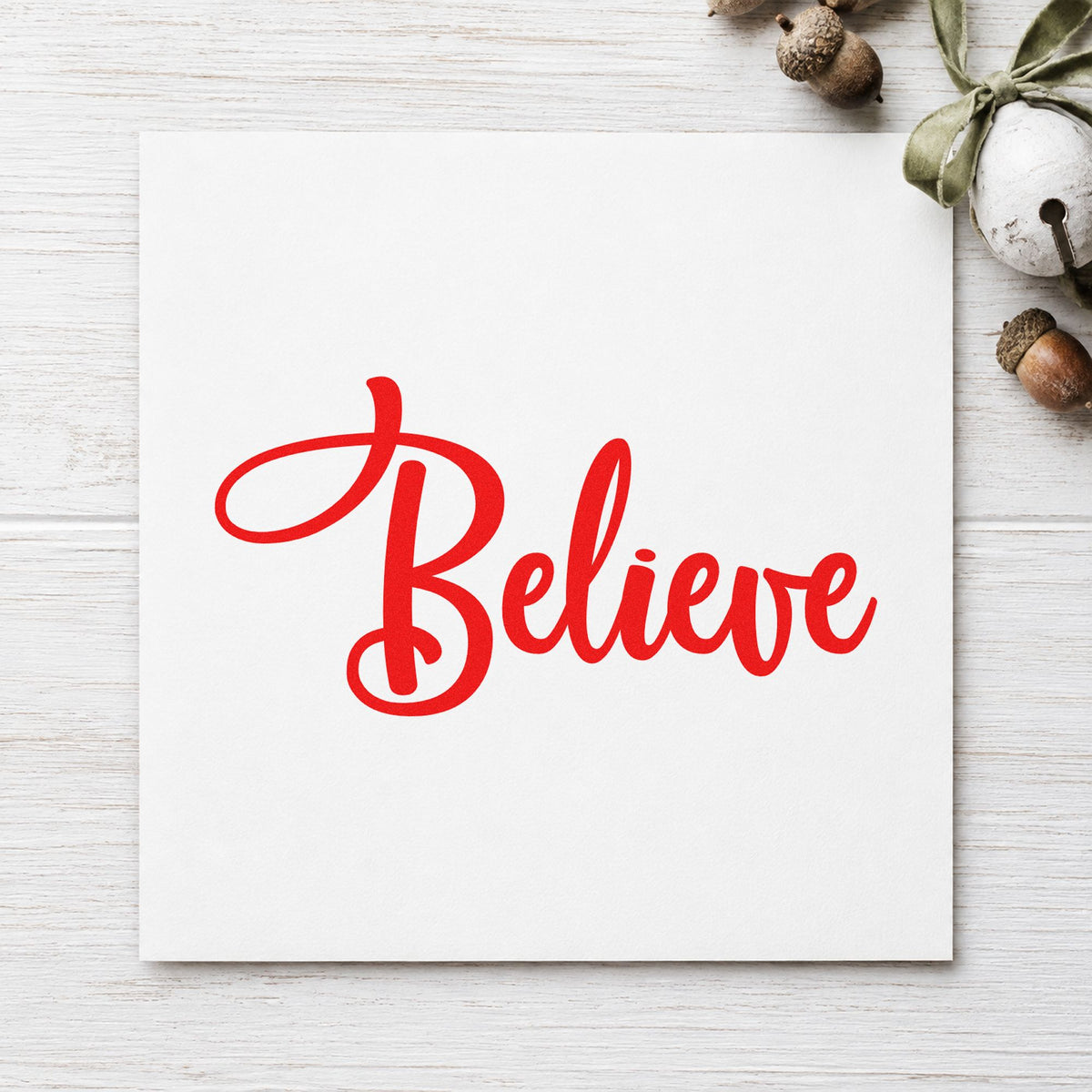 Believe Bold Script rubber stamp shown in red ink, stamped for projects such as storage tote labels.
