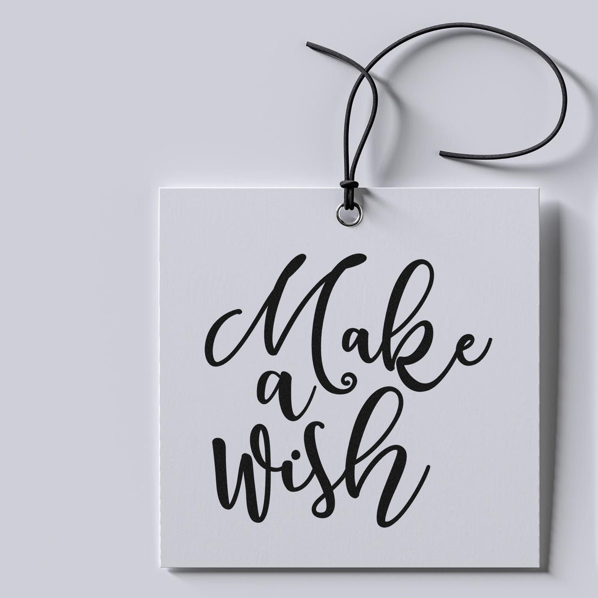 Make A Wish Sweeping Script Premium Wooden Stamp - Vintage Pro imprint stamped in black ink. "Make a Wish" appears in large sweeping script.