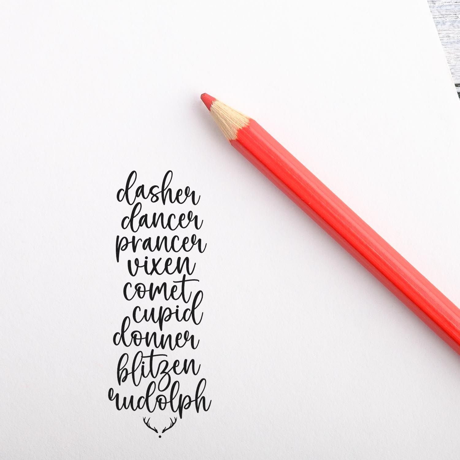 Christmas rubber stamp design with the reindeer names Dasher, Dancer, Prancer, Vixen, Comet, Cupid, Donner, Blitzen and Rudolph.