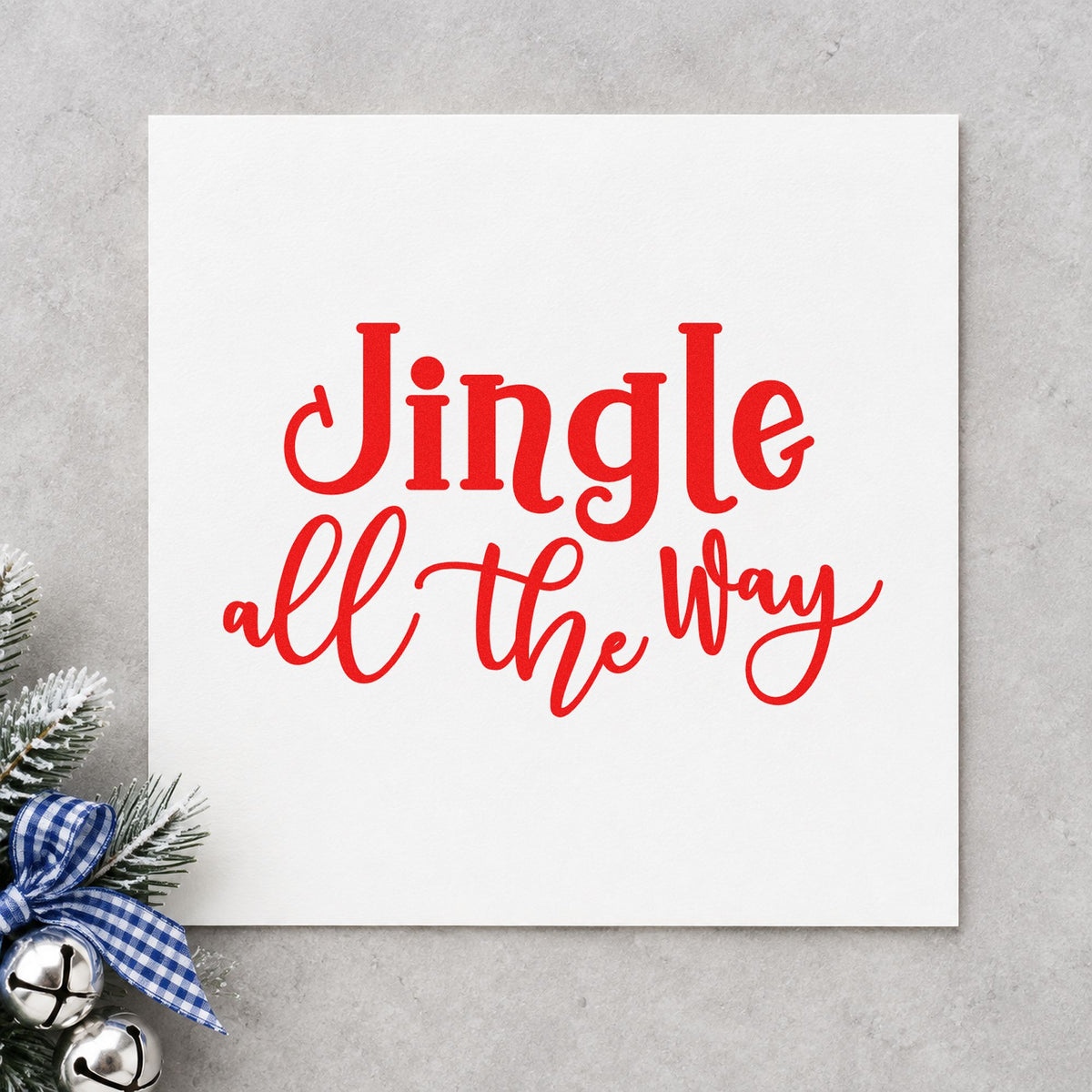 Jingle All The Way Script rubber stamp shown in red ink, stamped for projects such as hardware bin labels.