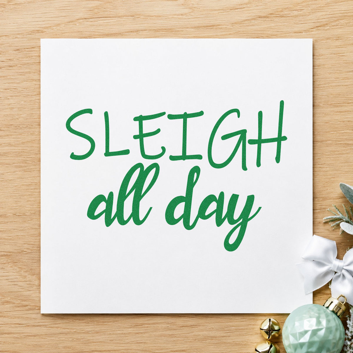 Sleigh All Day craft stamp imprinted in green ink on paper, a design suited to framed vanity ledge.