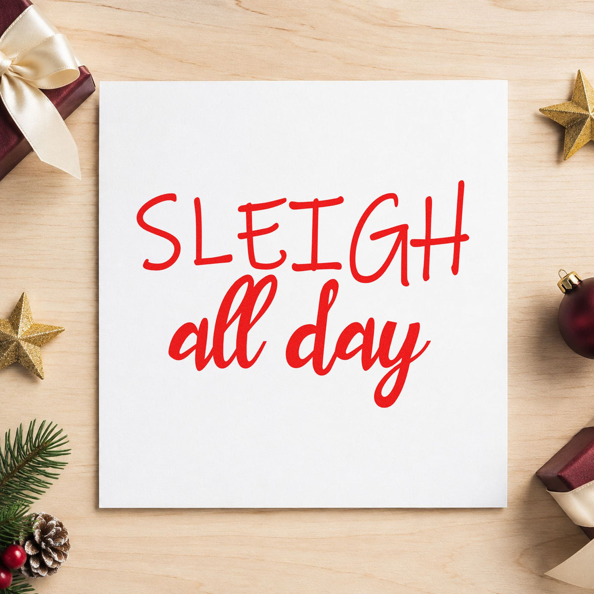 Sleigh All Day rubber stamp shown in red ink, stamped for projects such as makeup bag labels.