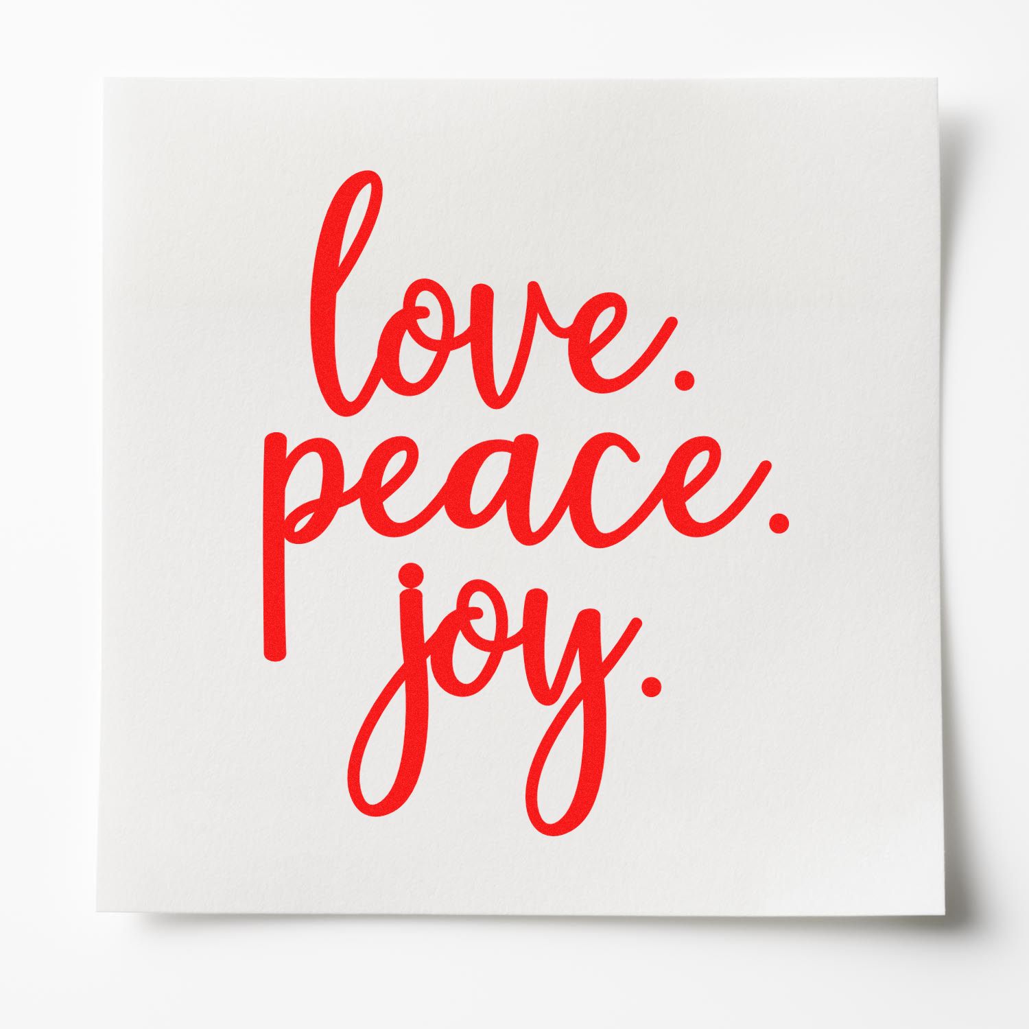 Love peace joy rubber stamp design in bold red script for cards, crafts, and festive packaging.