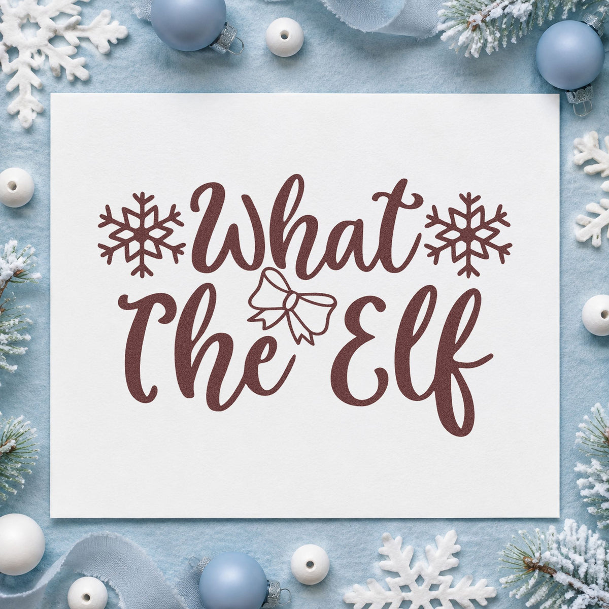 What The Elf Snowflakes rubber stamp printed in brown ink, ready for mishap log sheet and similar paper crafts.
