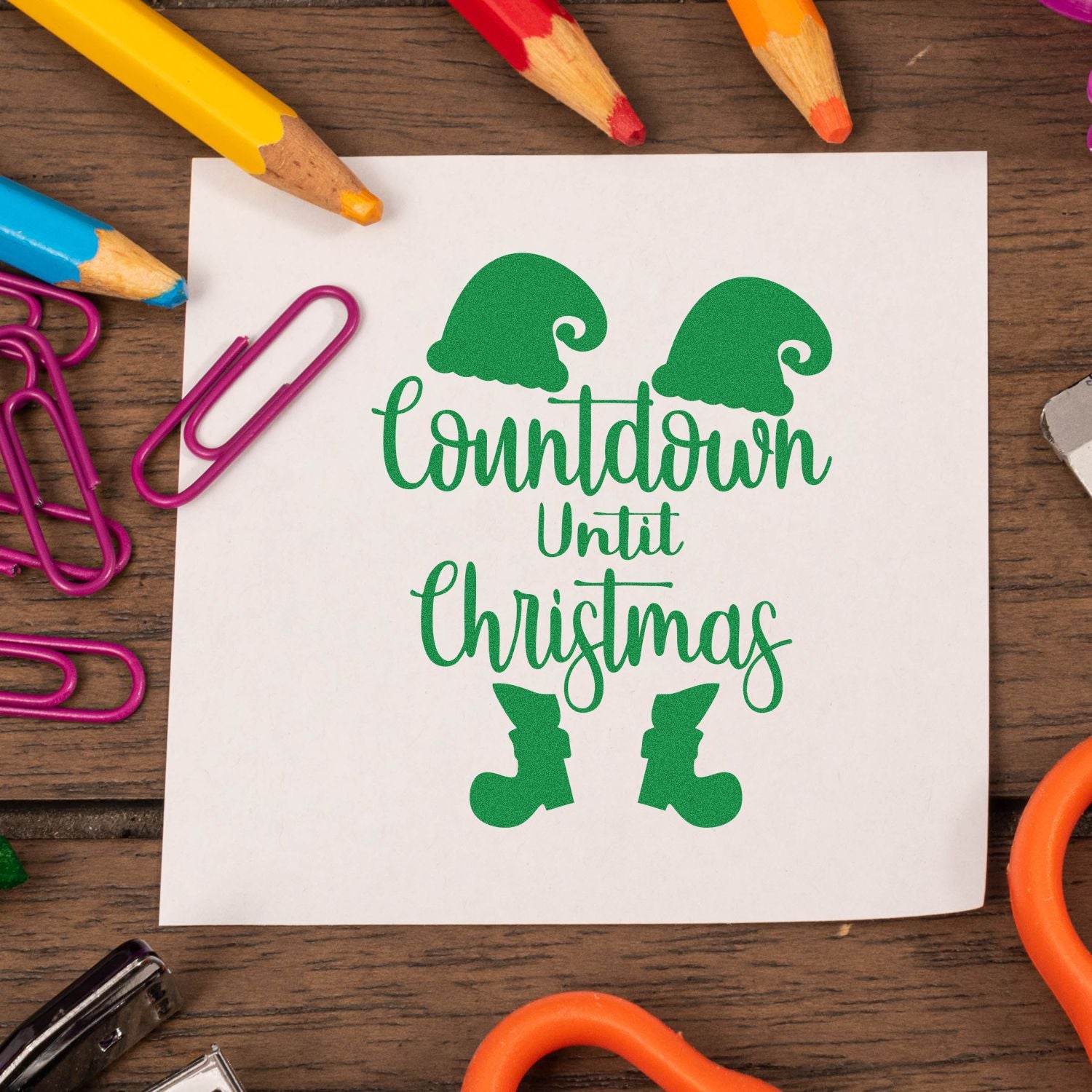 Christmas countdown rubber stamp design with elf hat and boots for holiday cards, crafts, and festive DIY projects.