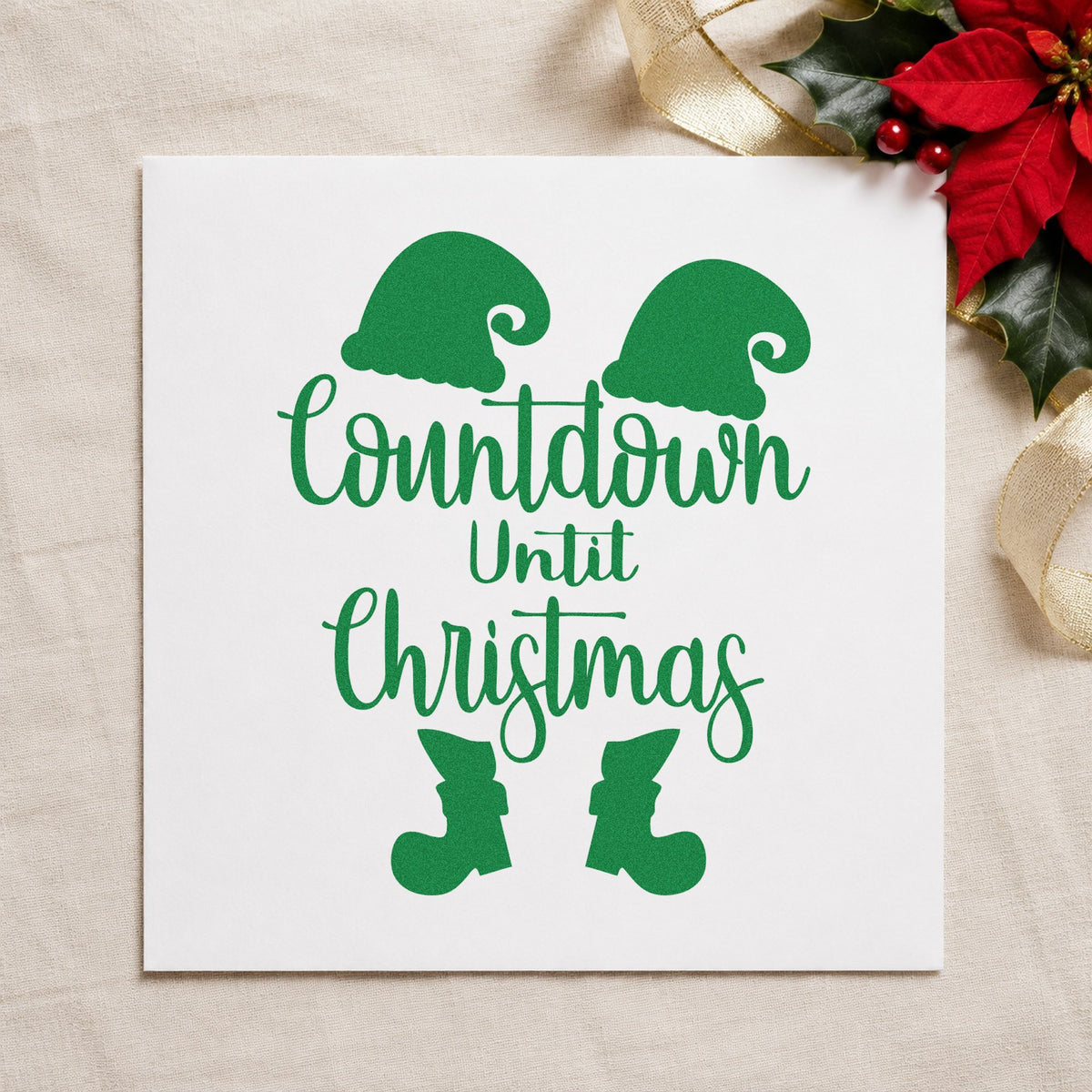 Countdown Until Christmas Elf craft stamp imprinted in green ink on paper, a design suited to framed kitchen chalk.