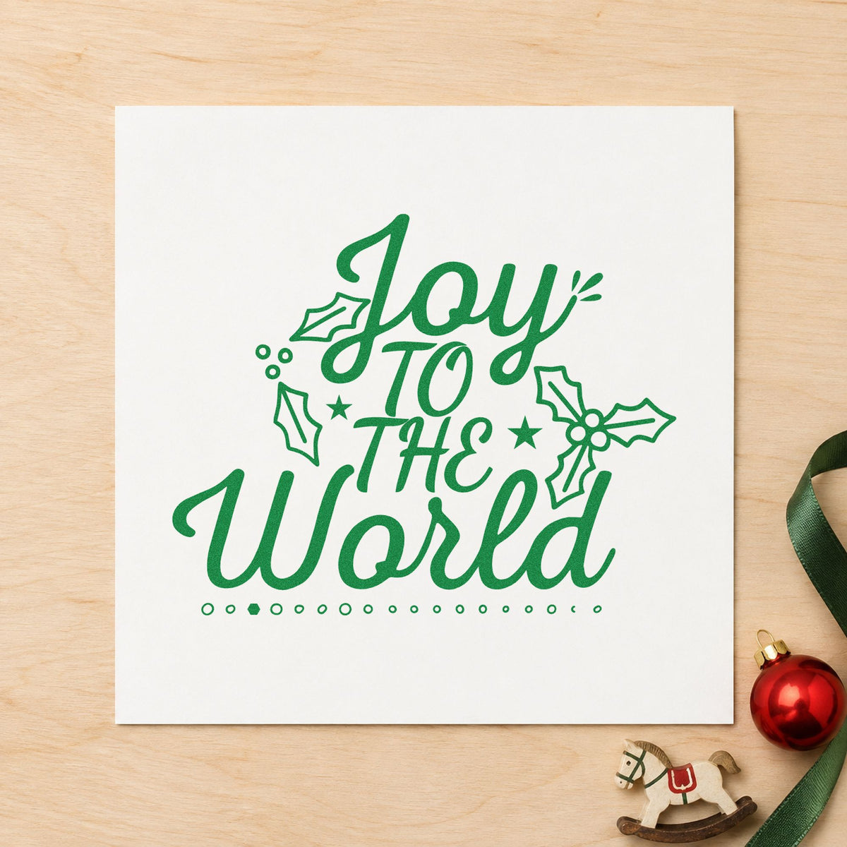 Joy To The World Holly craft stamp imprinted in green ink on paper, a design suited to framed band room.