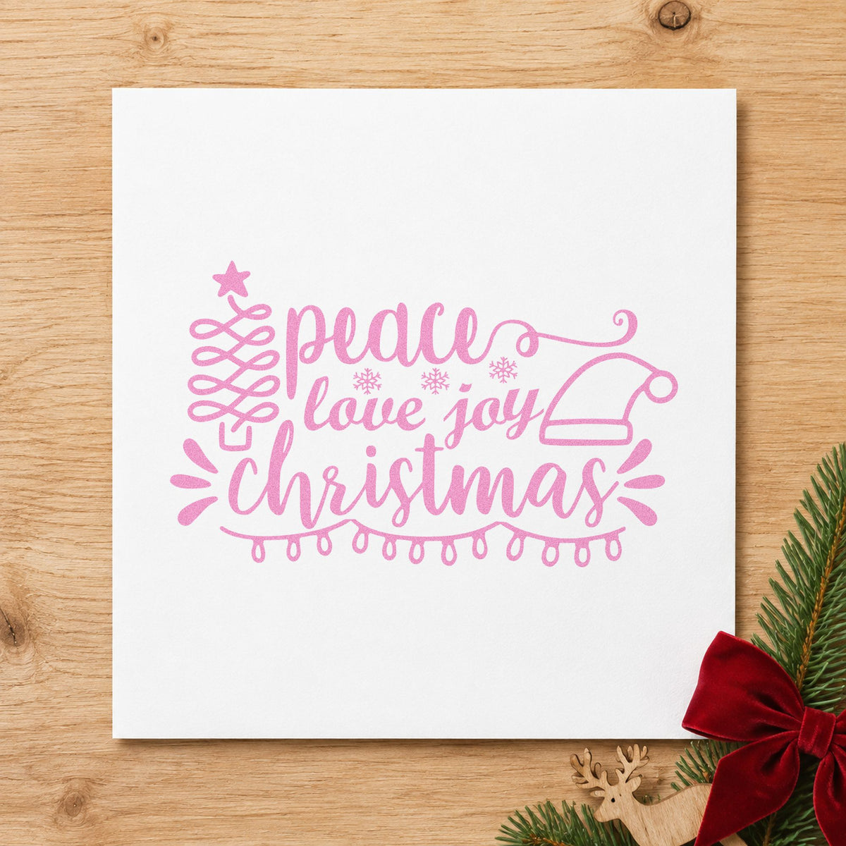 Peace Love Joy Christmas craft stamp in purple ink on cardstock, an easy option for kids room album page.