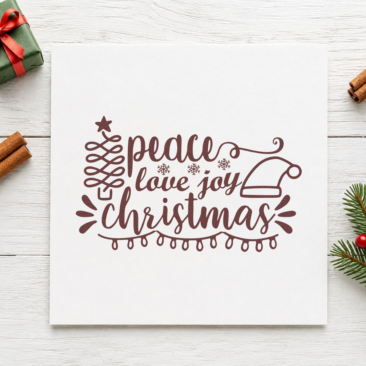 Peace Love Joy Christmas rubber stamp printed in brown ink, ready for chore reward sheet and similar paper crafts.