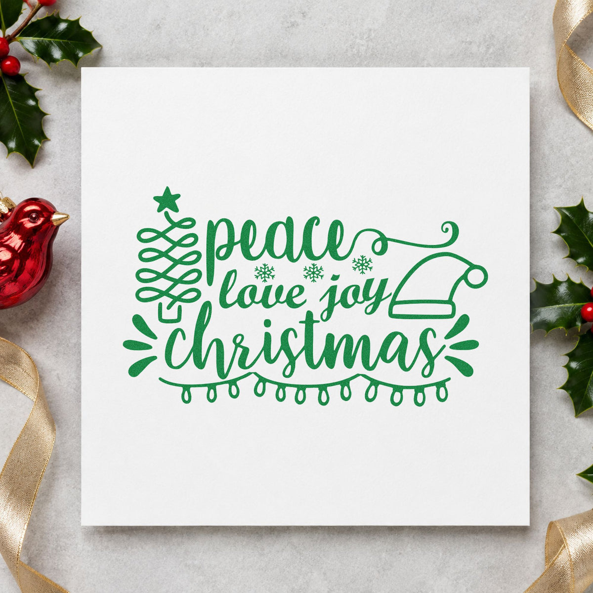 Peace Love Joy Christmas craft stamp imprinted in green ink on paper, a design suited to framed bunk nook.