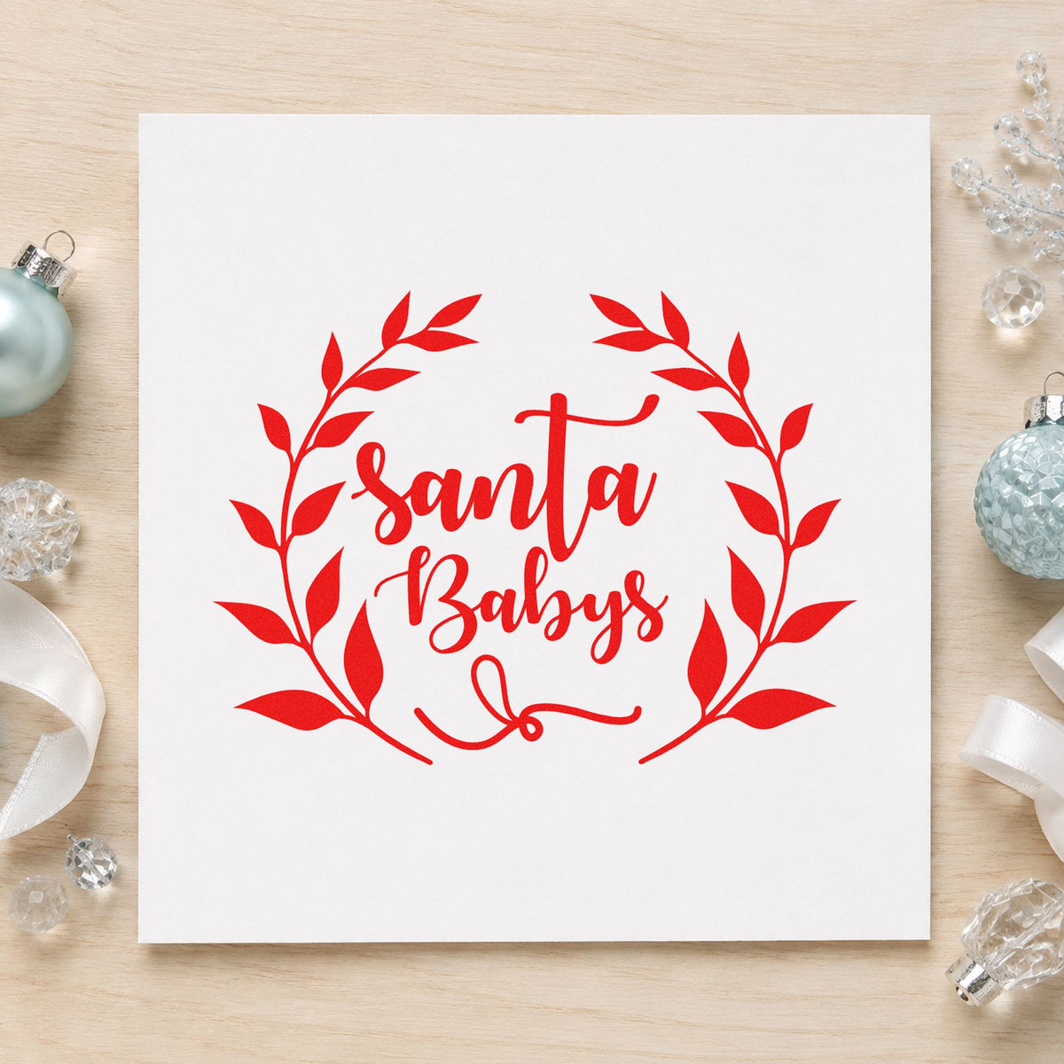 Santa Babys Leaf Wreath craft stamp in red ink on cardstock, an easy option for satin robe printing.