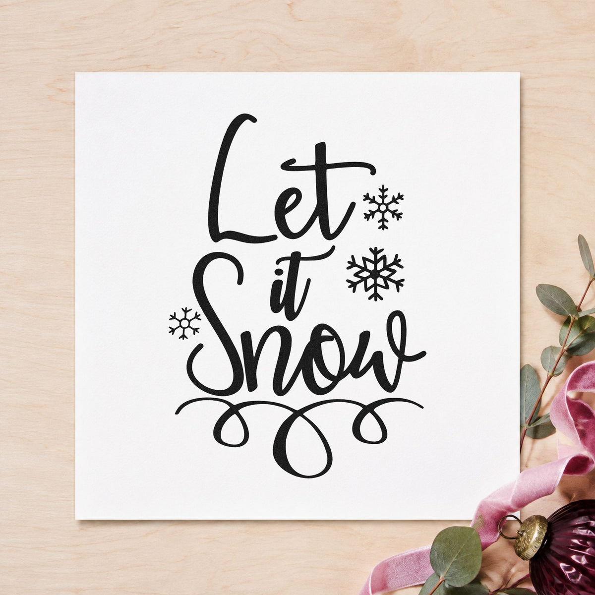 Let It Snow Loop Flourish rubber stamp printed in black ink, ready for stacked curls cards and similar paper crafts.