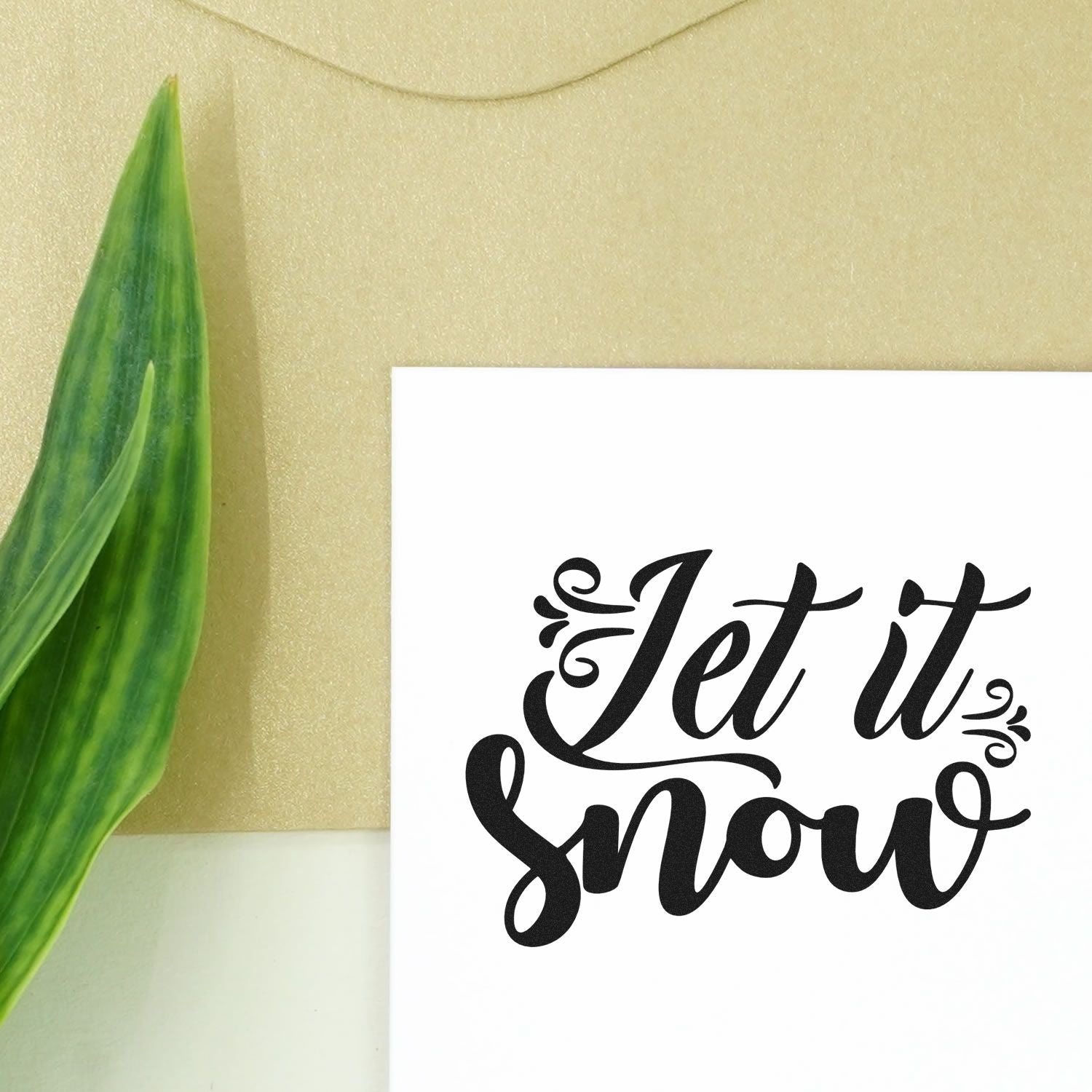 Let It Snow script rubber stamp design for winter greeting cards, holiday crafts and seasonal DIY projects.
