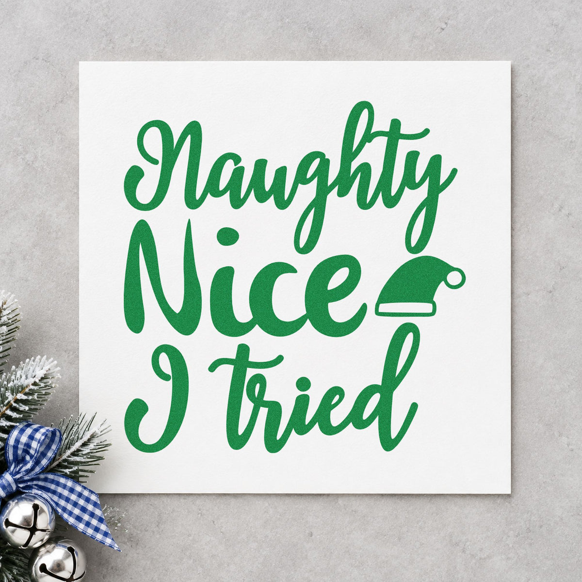 Naughty Nice I Tried Hat craft stamp imprint in green ink on a handmade project, one idea being party excuse placards.
