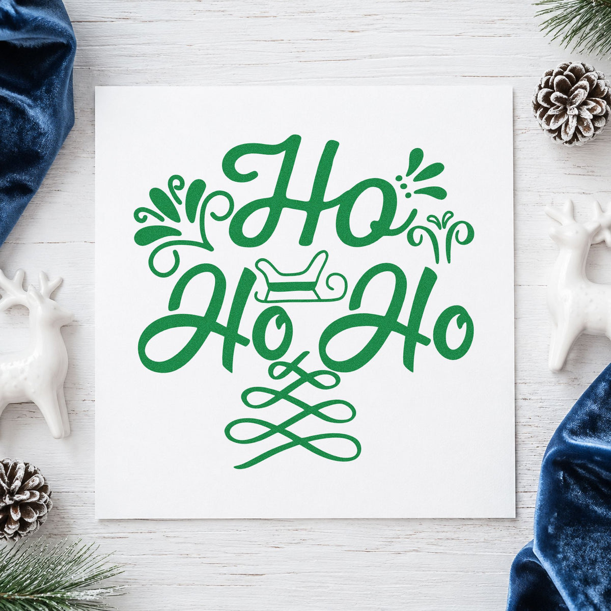 Ho Ho Ho Sleigh craft stamp imprint in green ink on a handmade project, one idea being open house signs.