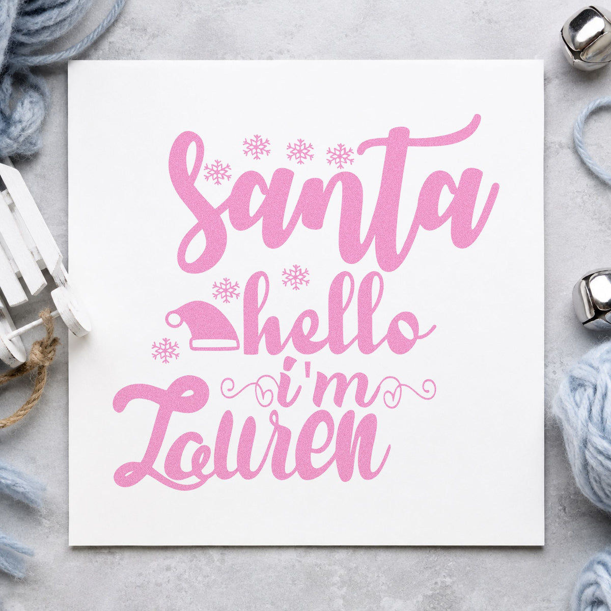 Santa Hello I'm Lauren craft stamp in purple ink on cardstock, an easy option for name practice album.
