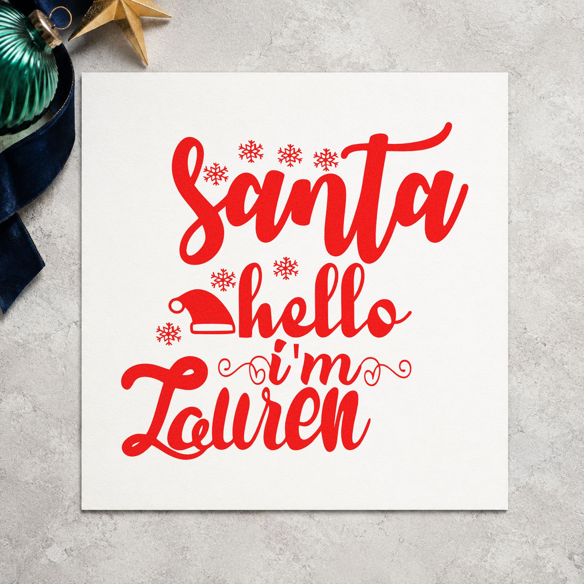 Santa Hello I'm Lauren rubber stamp shown in red ink, stamped for projects such as cubby slot labels.