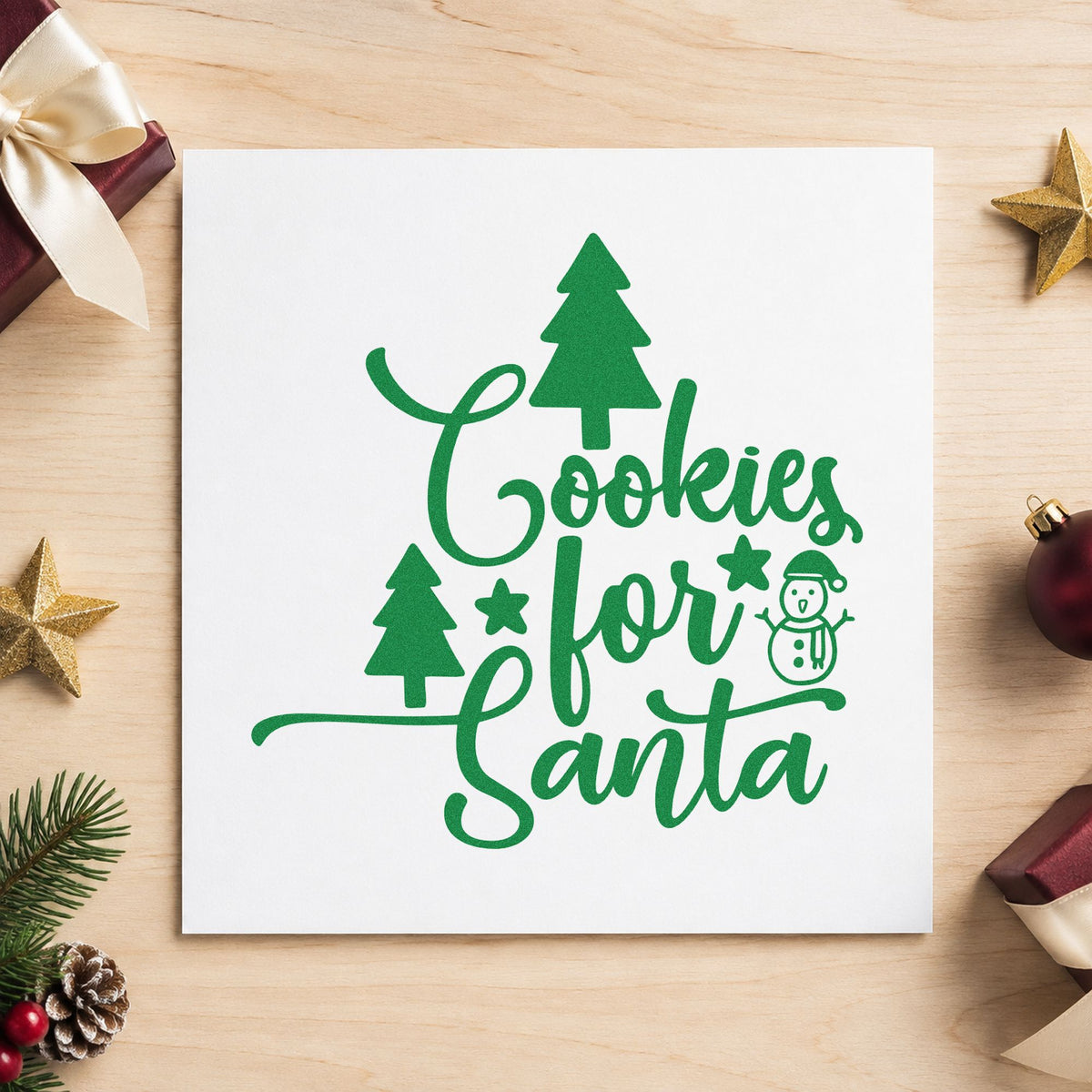 Cookies For Santa Trees craft stamp imprint in green ink on a handmade project, one idea being family night passes.