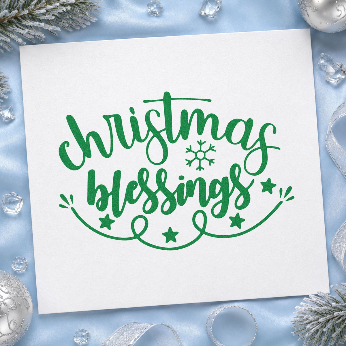 Christmas Blessings Snowflake craft stamp imprinted in green ink on paper, a design suited to framed office entry.
