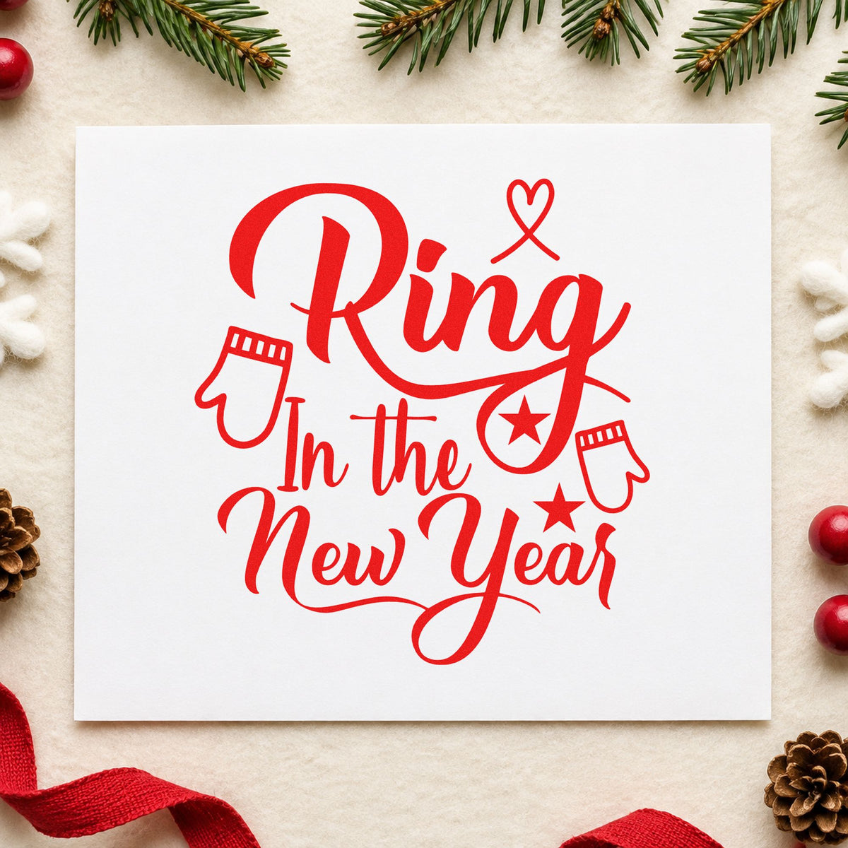 Ring In The New Year craft stamp in red ink on cardstock, an easy option for knit cuff printing.