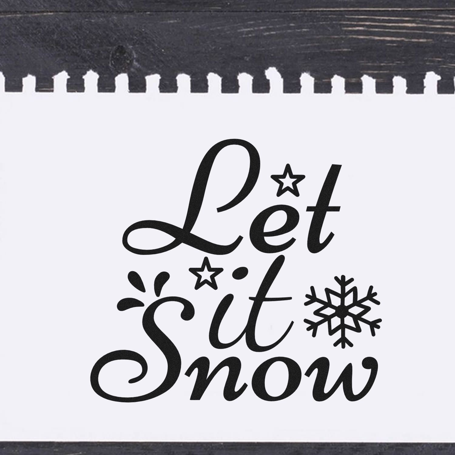 Let it Snow rubber stamp design with snowflake, ideal for winter crafts and holiday cards.